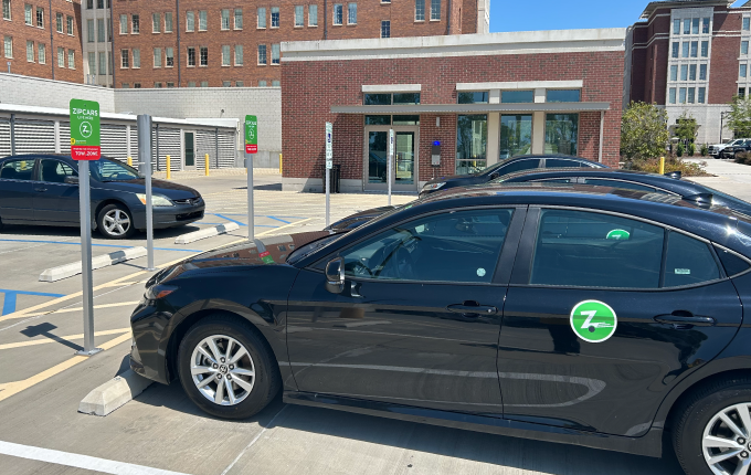 Zip Cars parked at Campus Village