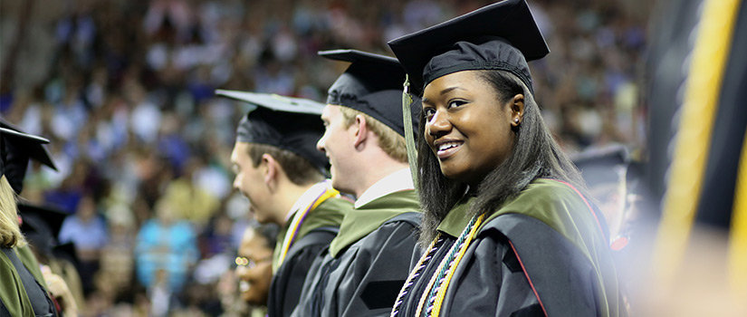 graduates in cap and gowns