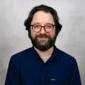 headshot of tom davies