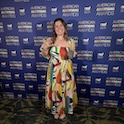 Finley Edwards poses with her ADDY award at the American Advertising Awards.