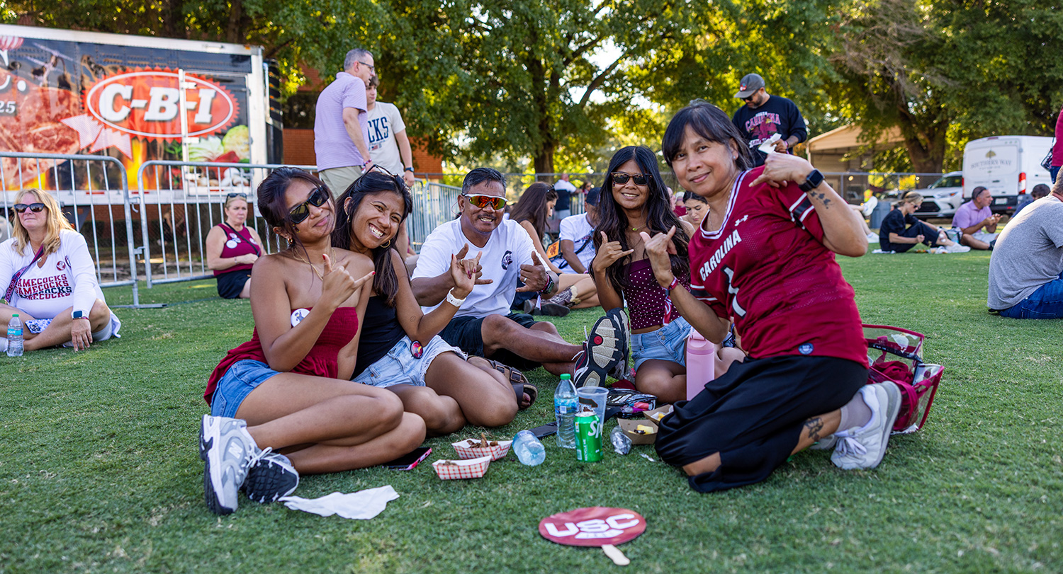 Family members together at Family Weekend tailgate event.