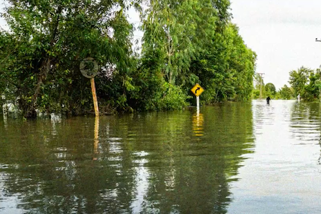 road experiencing heavy flooding