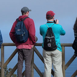 two men looking off into the distance 