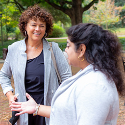 Professor talks with student