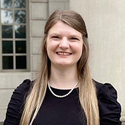 woman with blond hair and black shirt on