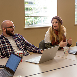 students talking in a classroom