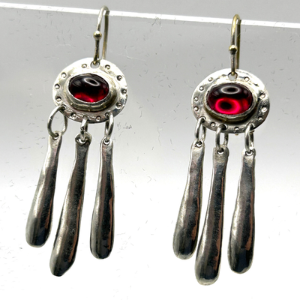 Silver dangly earrings with ruby details