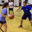 students playing basketball