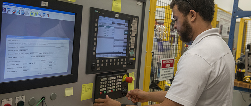 grad student operates the AFP machine