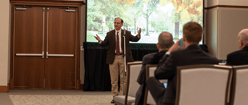 The dean speaks at the conference.