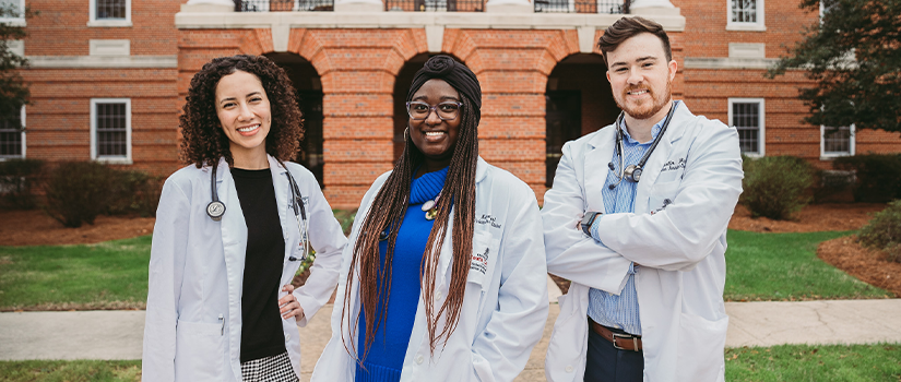 Physician Assistant students outside an academic building