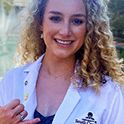 student in white coat