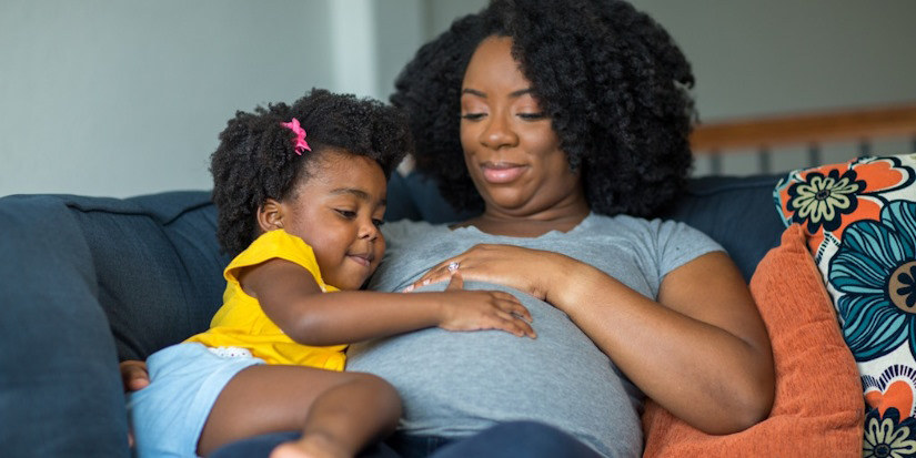 pregnant mother and child