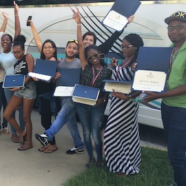 tourism students with their certificates