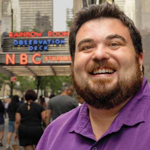 Chris Rosa ’15 standing with the NBC building in the background