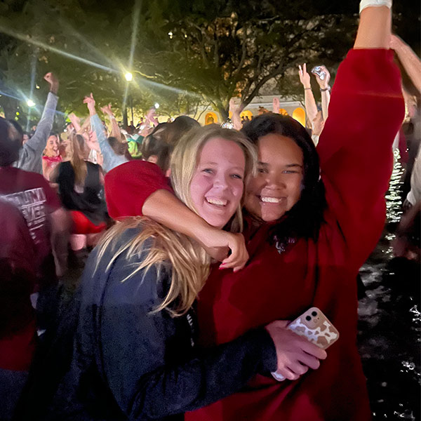 Cassidy Clark, right, celebrated the women's basketball national championship in the Thomas Cooper Library fountain.